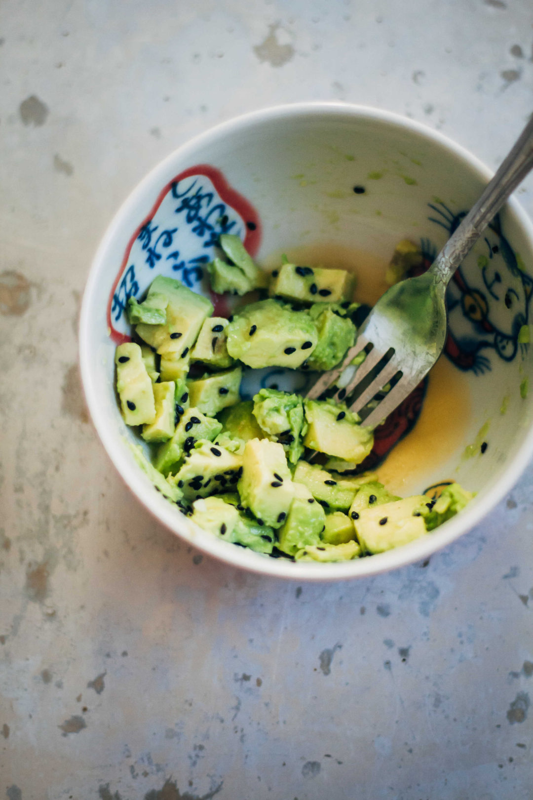 Vegan Onigiri w/ PonzuMarinated Avocado + Shichimi Togarashi Well