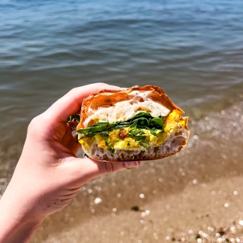 The BEST Vegetarian Beach Sandwich | Curried Chickpea Salad Sandwich with Black Pepper Hot Honey Butter | Well and Full | #vegetarian #recipe #sandwich #beach
